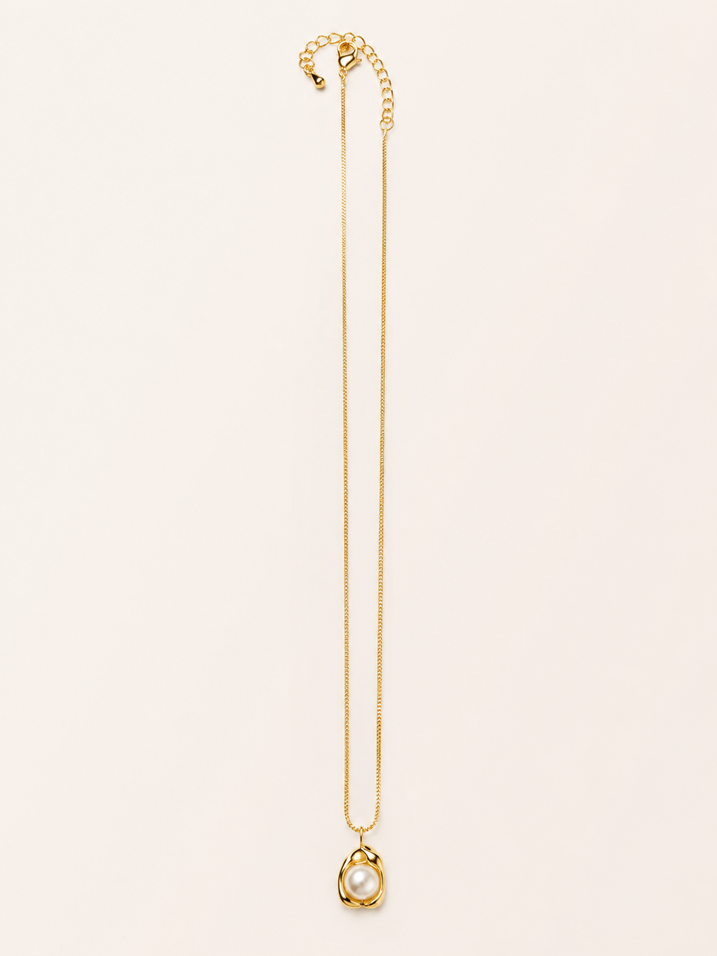 Organic gold pearl pendant necklace on a delicate chain, minimalist everyday jewellery in 14K gold plated finish by Soft Sunday Co.
